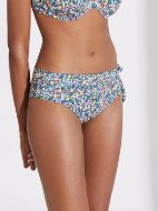 Εικόνα της Ysabel Mora φλοράλ πολύχρωμο ψηλόμεσο μαγιό σλιπ, με φιόγκο στο πλάι.