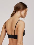 Εικόνα της Γυναικείο σουτιέν strapless μαύρο με ανάγλυφο σχέδιο. Με μπανέλα και ελαφριά επένδυση. Περιέχει μαύρες ράντες.